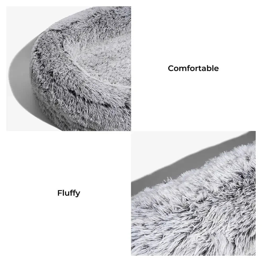 Super Large Plush Dog Sofa Bed in gray color with waterproof, washable cover and raised sides, perfect for large dogs lounging comfortably.