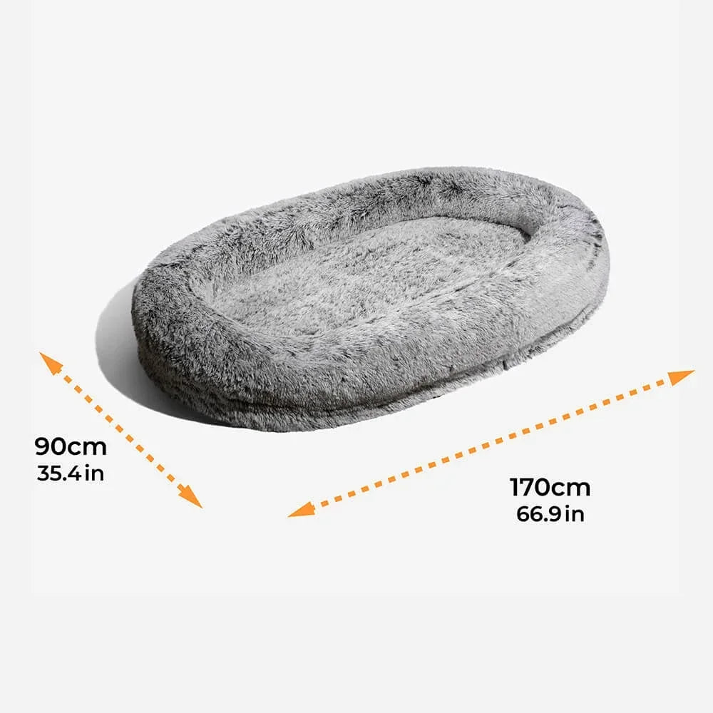 Super Large Plush Dog Sofa Bed in gray color with waterproof, washable cover and raised sides, perfect for large dogs lounging comfortably.